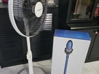 Washing machine, standing fan, handheld vacuum in box, tabletop fan