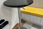 5 boxes of light sticks, art pieces and easel stands, 2 long tables wi...