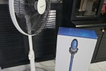 Washing machine, standing fan, handheld vacuum in box, tabletop fan