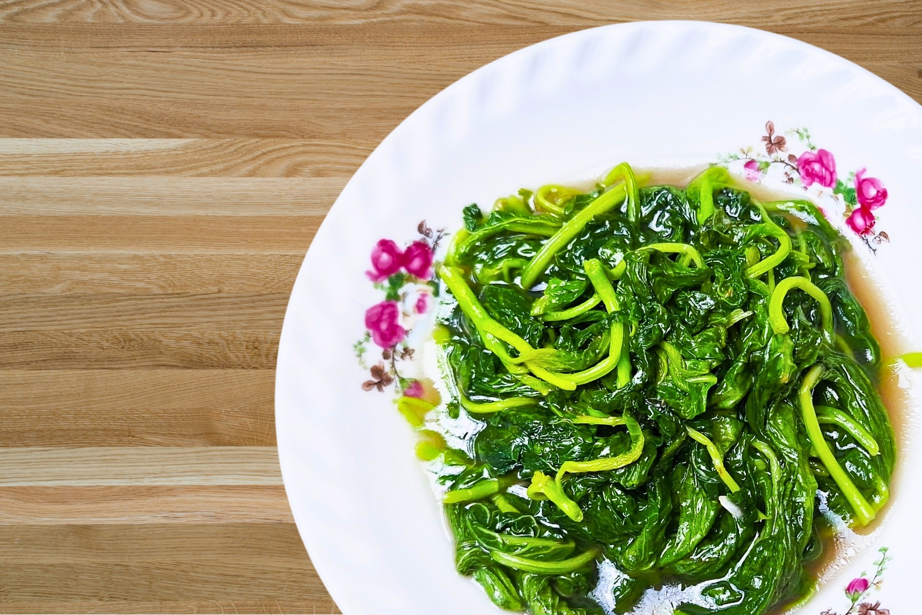 Bowl of Chinese spinach stirfry, Singapore