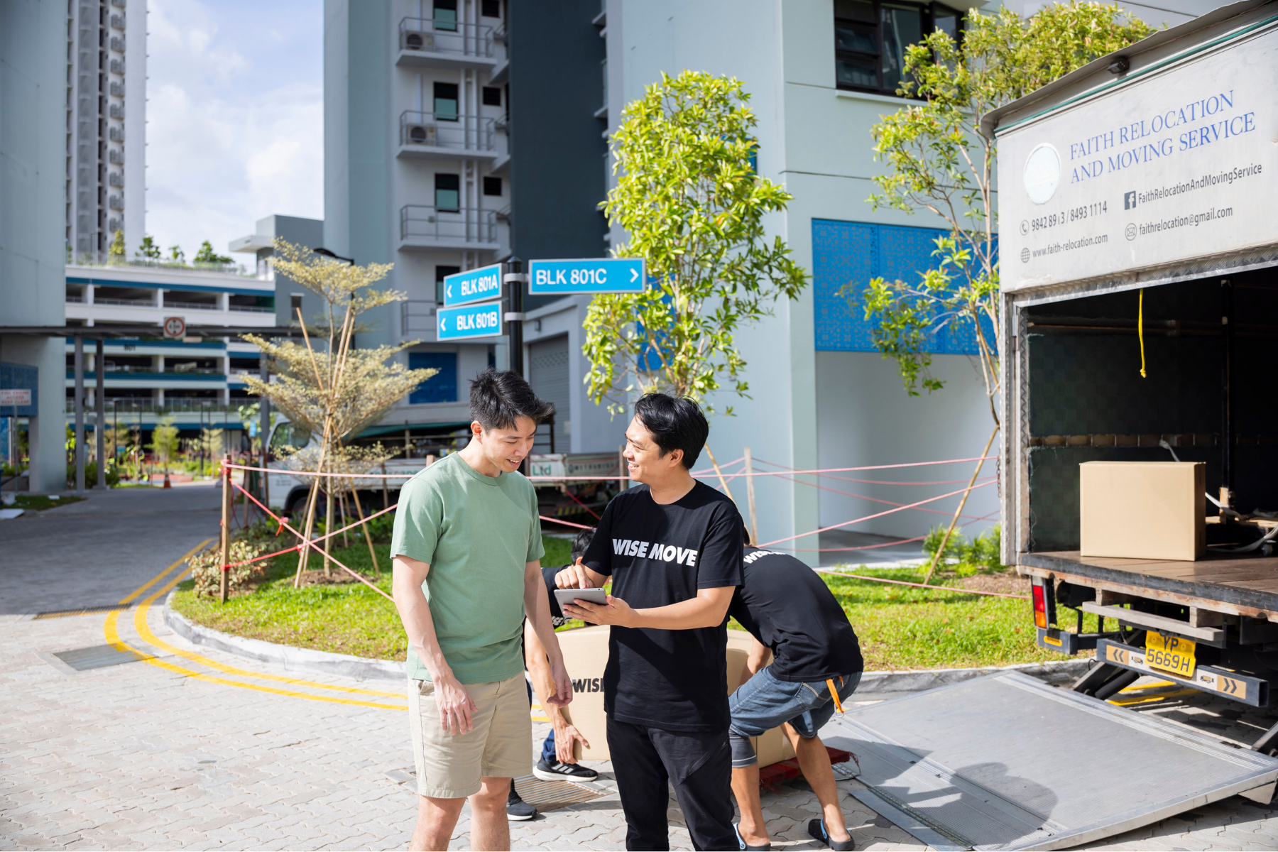 Movers helping a customer plan a move around the school holidays