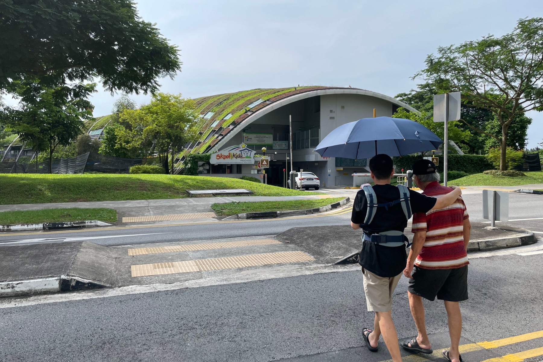 Walking with umbrella in SIngapore